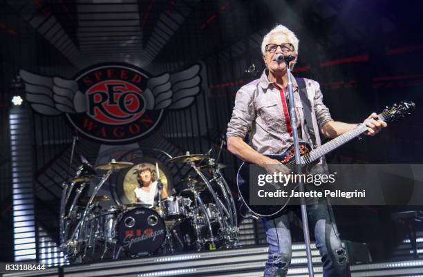 Bryan Hitt and Kevin Cronin from REO Speedwagon perform in concert at Northwell Health at Jones Beach Theater on August 16, 2017 in Wantagh, New York.