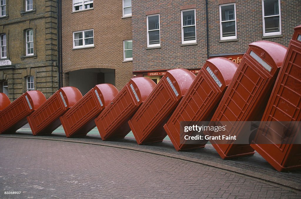 Public art of telephone boxes looking like dominoe