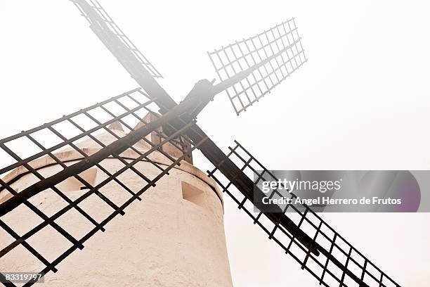 windmill with mist in spain with tone.  - angel herrero de frutos stock-fotos und bilder