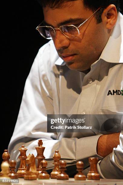 Indian chess world champion Viswanathan Anand concentrates during his match against the Russian chess grandmaster Vladimir Kramnik on October 17,...