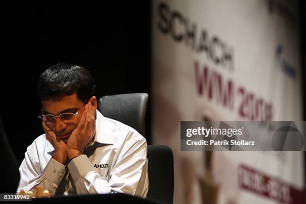 Indian chess world champion Viswanathan Anand concentrates during his match against the Russian chess grandmaster Vladimir Kramnik on October 17,...