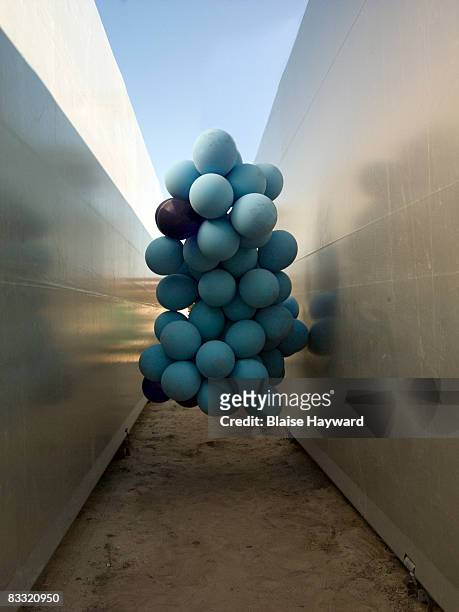 floating balloons - modern art stock pictures, royalty-free photos & images