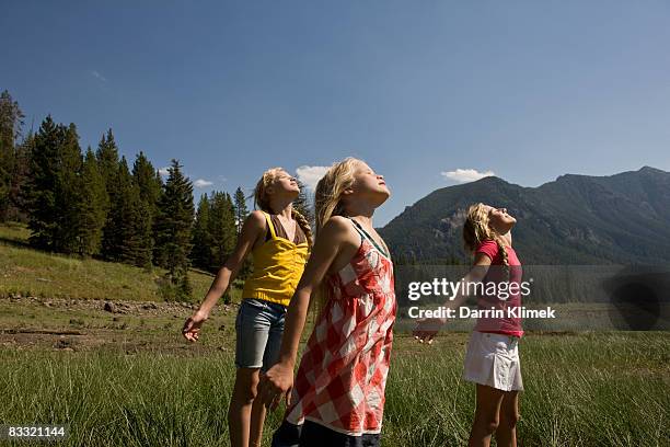 sisters taking in the fresh air - bozeman montana stock pictures, royalty-free photos & images