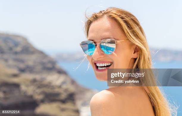 young woman with perfect smile - sunglasses reflection stock pictures, royalty-free photos & images