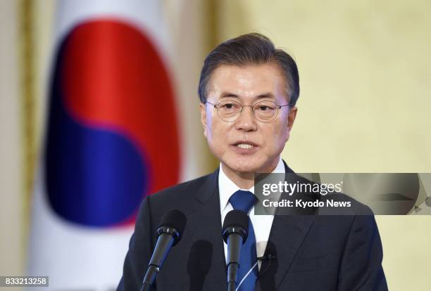 At a press conference marking his 100th day in office on Aug. 17 in Seoul, South Korean President Moon Jae In says a postwar agreement that led to...