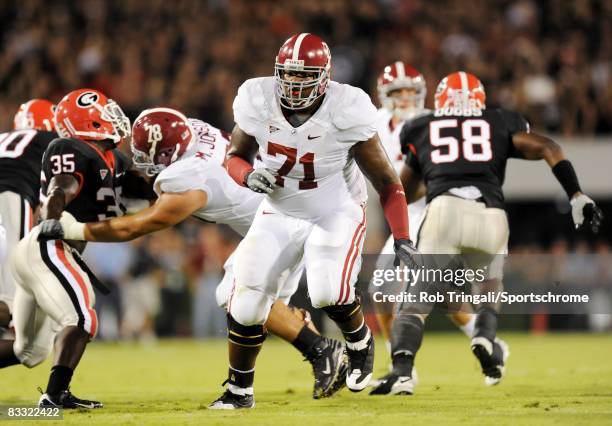 Andre Smith of the Alabama Crimson blocks against the Georgia Bulldogs during a game at Sanford Stadium on September 27, 2008 in Athens, Georgia....
