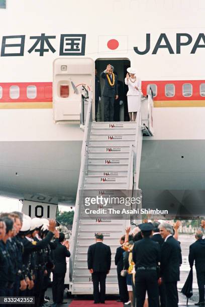 Emperor Akihito and Empress Michiko are seen on departure for Japan at the U.S. Air Force Hickam Field on June 25, 1994 in Honolulu, Hawaii.