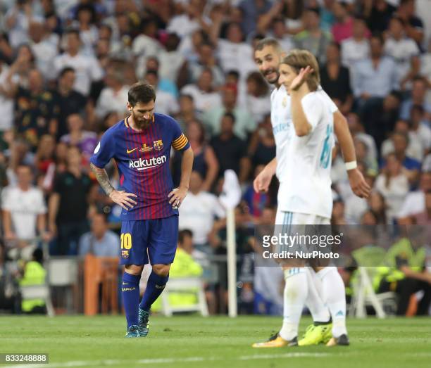Barcelona's Argentinian forward Lionel Messi delusion during the second leg of the Spanish Supercup football match Real Madrid vs FC Barcelona at the...