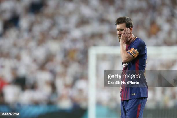 Barcelona's Argentinian forward Lionel Messi reacts during the second leg of the Spanish Supercup football match Real Madrid vs FC Barcelona at the...