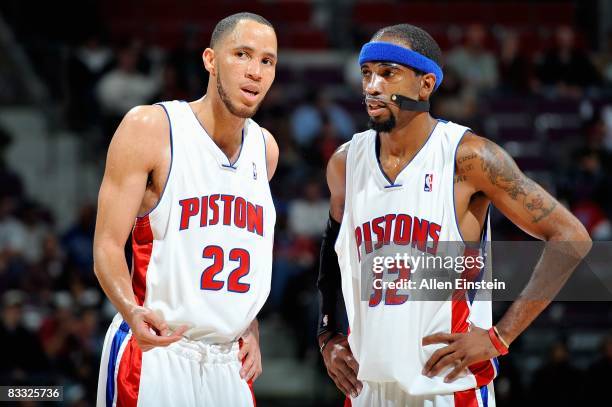Tayshaun Prince and Richard Hamilton of the Detroit Pistons talk on the court during the preseason game against the Milwaukee Bucks on October 8,...