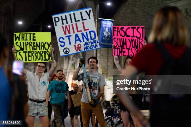 Protestors face a police force at an attempt to take down the statue of former Mayor and police commissioner Frank Rizzo, across from City Hall, in...