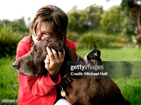 Girl with dog in country field Girl with dog in country field