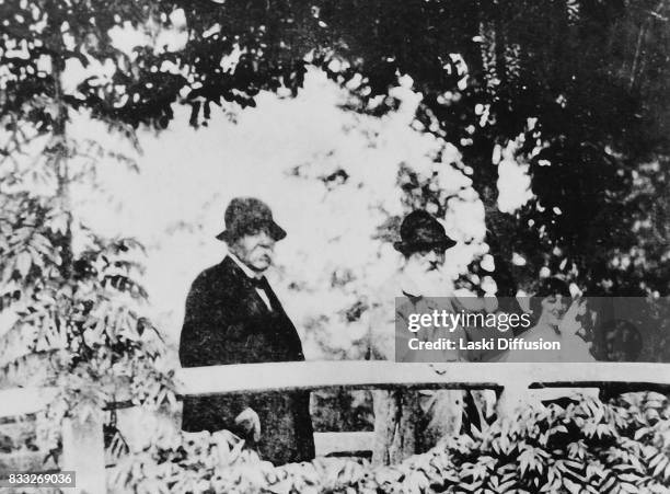1920s: French politician Georges Clemenceau and his friend Claude Monet , famous impressionist painter, in Monet's garden in Giverny, France, 1920s....