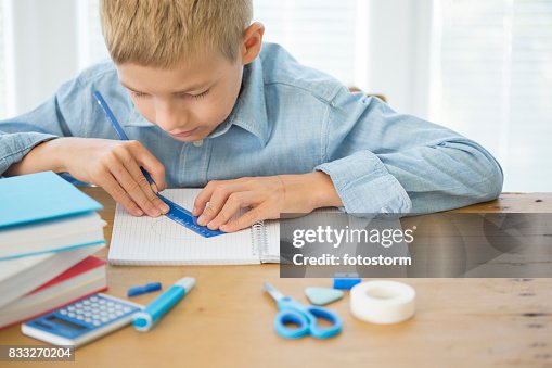 Boy Good At Math Boy Doing His Mathematics Assignment High-Res Stock Photo - Getty Images