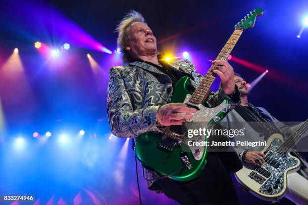 James Young and Ricky Phillips from Styx perform in concert at Northwell Health at Jones Beach Theater on August 16, 2017 in Wantagh, New York.