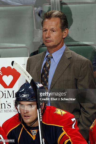 Assistant Coach Mike Kitchen of the Florida Panthers keeps an eye on his team from the bench against the Minnesota Wild at the Bank Atlantic Center...