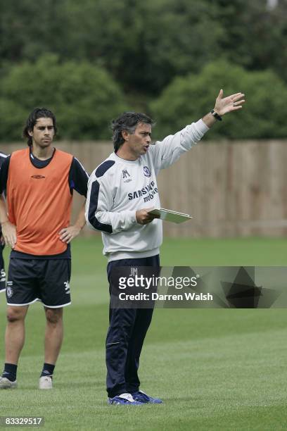 Jose Mourinho of Chelsea FC directs Chelsea players in pre-season training at Chelsea's Cobham training ground on August 5, 2005.