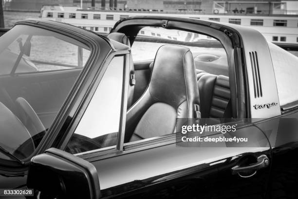 parked open porsche 911 targa during the event with magnus walker on the fish market hamburg - porsche stock pictures, royalty-free photos & images