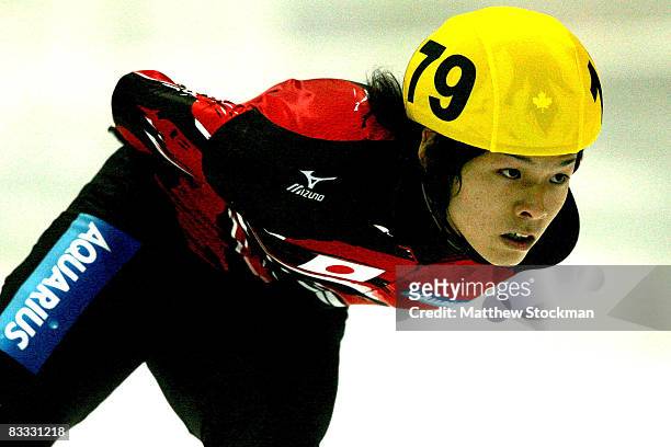 Yuzo Takamido of Japan competes in the 1000 meter preliminaries during the Samsung ISU World Cup Short Track at the Utah Olympic Oval October 17,...