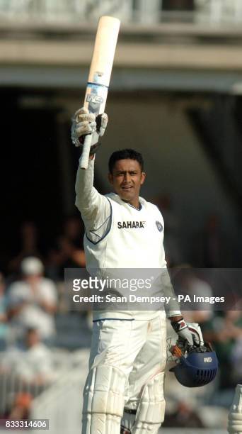 India's Anil Kumble celebrates scoring his maiden Test century during the second day of the Third npower Test match against England at The Brit Oval,...