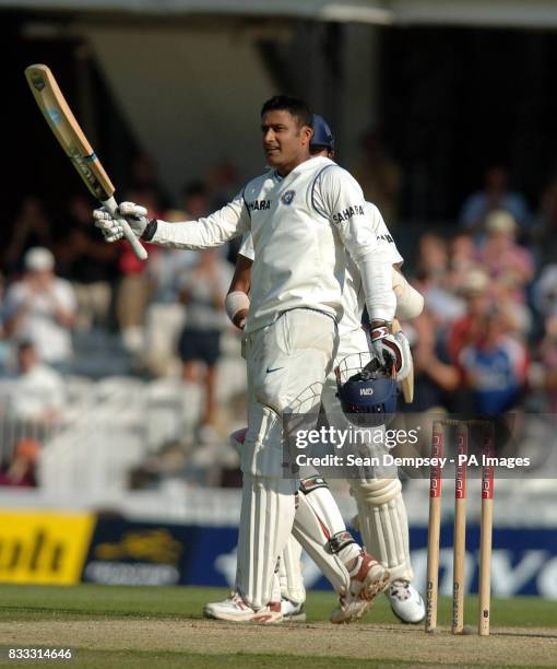 India's Anil Kumble celebrates scoring his maiden Test century during the second day of the Third npower Test match against England at The Brit Oval,...