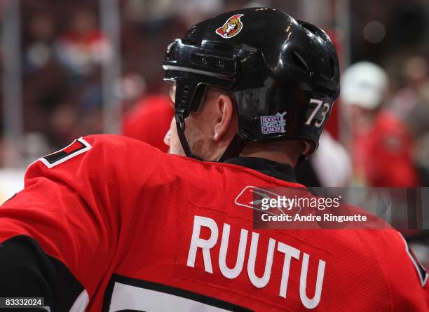 Jarkko Ruutu of the Ottawa Senators wears the Hockey Fights Cancer sticker on the back of his helmet prior to a game against the Phoenix Coyotes at...