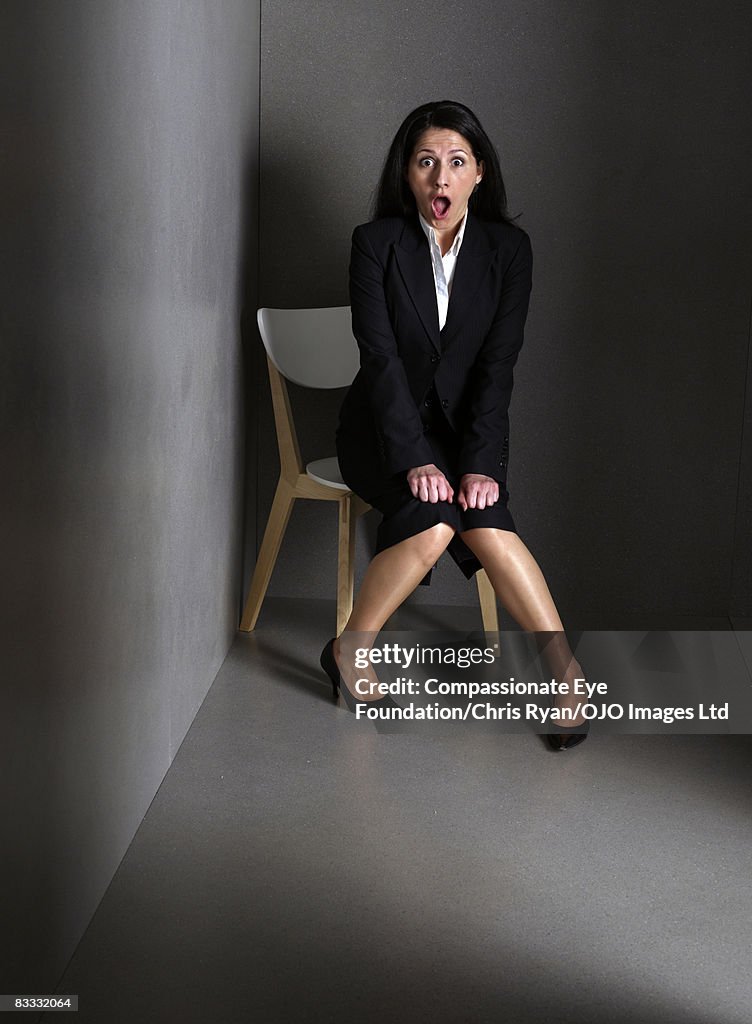 Businesswoman looking surprised