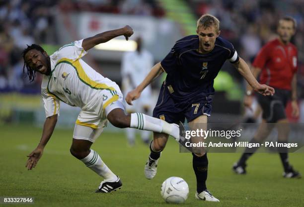 Scotland's Darren Fletcher challenges South Africa's Macbeth Sibaya during the International Friendly at Pittodrie Stadium, Aberdeen.