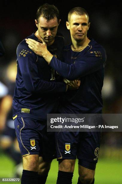 Scotland's goalscorer Kris Boyd is congratulated at full time by Kenny Miller after the International Friendly at Pittodrie Stadium, Aberdeen.