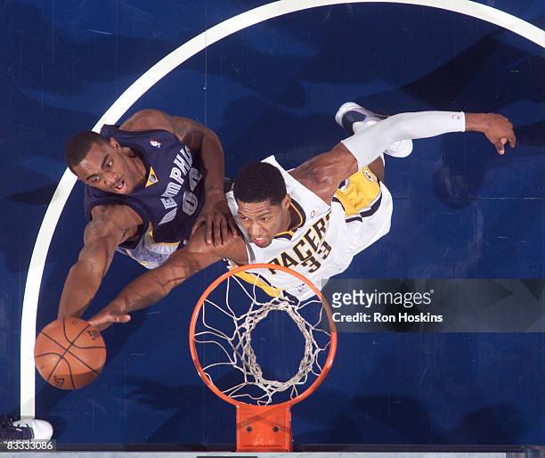Danny Granger of the Indiana Pacers battles Darrell Arthur of the Memphis Grizzlies at Conseco Fieldhouse on October 17, 2008 in Indianapolis,...