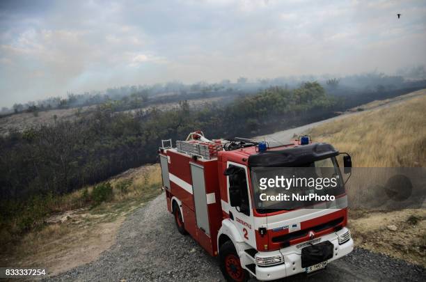 Fire truck is moving some 100 metres from the Bulgarian-Turkish border fence, trying to stop the fire go in Turkey. Fire destroyed near 2000 acres...