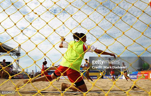 Rasha Obeidat of Jordan is beaten in the goalmouth by a shot from the Hong Kong China team in the Womens Beach Handball on day one of the 2008 Asian...