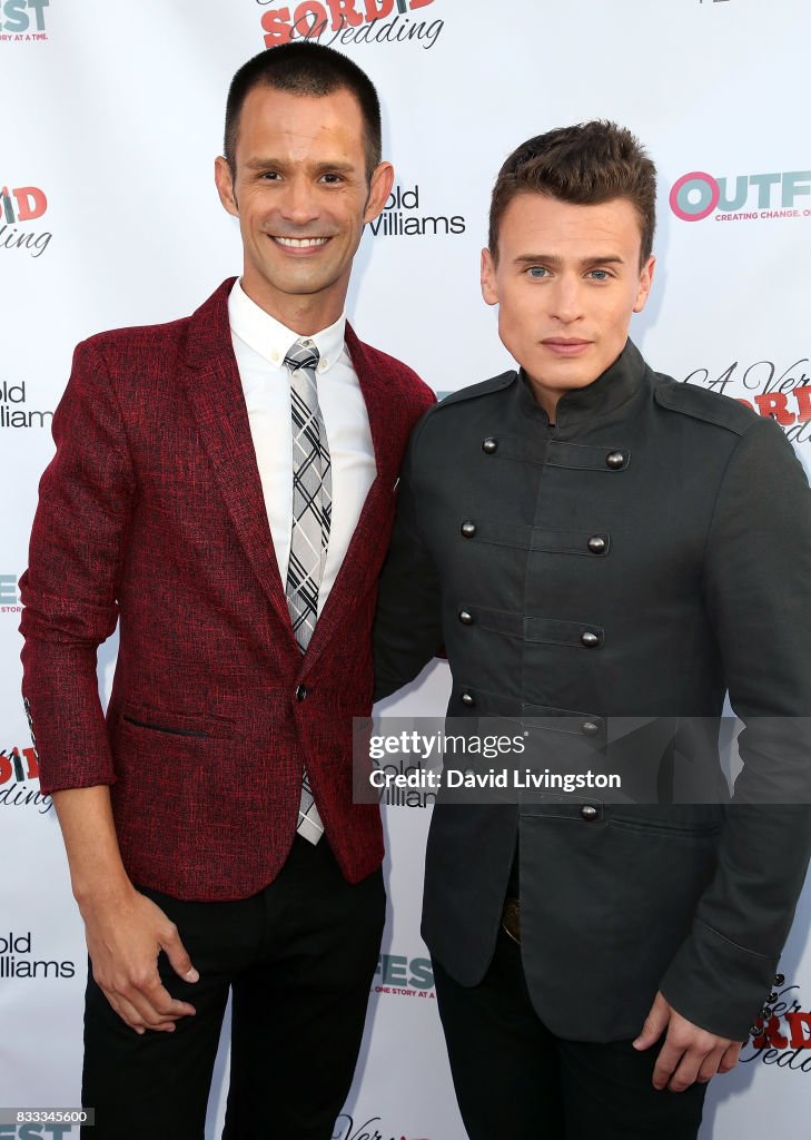 Actors Emerson Collins and Blake McIver Ewing attend the premiere of