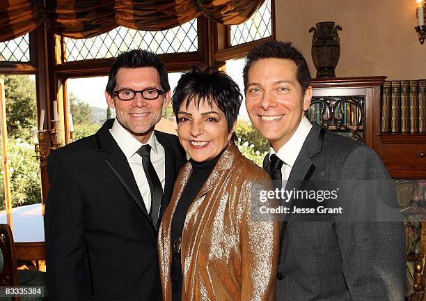 Liza Minnelli poses with Terrence Flannery and Michael Feinstein during their wedding ceremony held at a private residence on October 17, 2008 in Los...