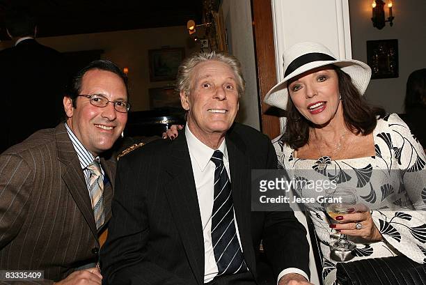 Percy Gibson, Nolan Miller and Joan Collins attend the wedding of Michael Feinstein and Terrence Flannery held at a private residence on October 17,...