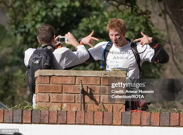 Prince Harry jokes as he poses for a picture at the start of the Enduro 2008 Motorcycle Rally to benefit UNICEF, the Nelson Mandela Children's Fund...