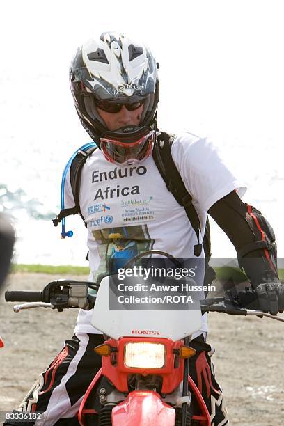 Prince William prepares to set off at the start of the Enduro 2008 Motorcycle Rally to benefit UNICEF, the Nelson Mandela Children's Fund and...