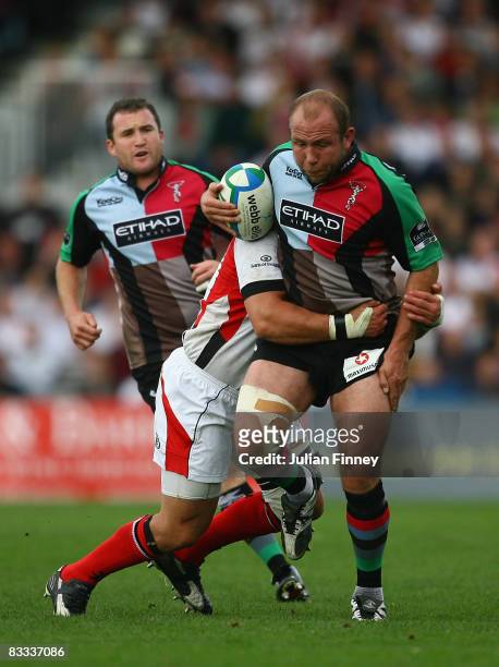 Gary Botha of Quins is tackled by Brendan Botha of Ulster during the Heineken Cup match between Harlequins and Ulster at the Stoop on October 18,...