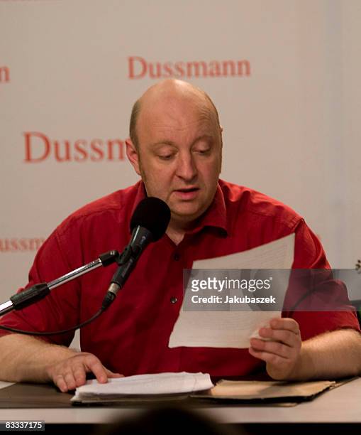 German author and cabaret artist Horst Evers reads during the CD presentation of 'Schwitzen ist, wenn Muskeln weinen' at the Dussmann shopping center...