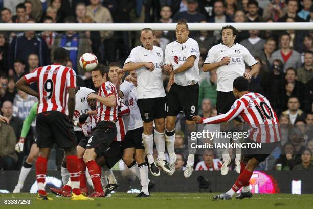 Kieran Richardson of Sunderland shoots to score against Fulham during their Barclays Premier League game at Craven Cottage in London, England, on...