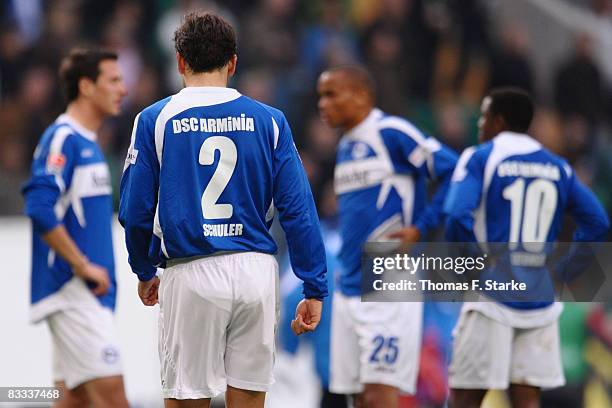 Berat Sadik, Markus Schuler, Siyabonga Nkosi and Christopher Katongo of Bielefeld stand dejected on the pitch after the Bundesliga match between VFL...