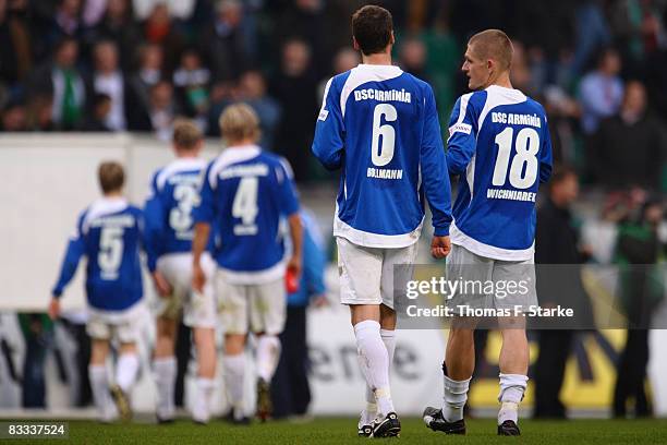 Ruediger Kauf, Radim Kucera, Nico Herzig, Markus Bollmann and Artur Wichniarek of Bielefeld leave the pitch dejected after the Bundesliga match...