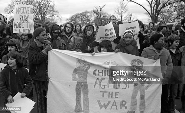 Washington, DC : A large group of children hold a sign reading "Children Against The War" during a Vietnam Protest in Washington, DC on the day of...