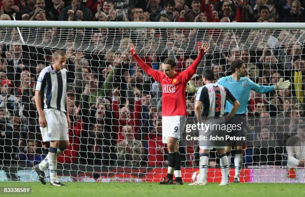 Dimitar Berbatov of Manchester United celebrates scoring their third goal during the Barclays Premier League match between Manchester United and West...