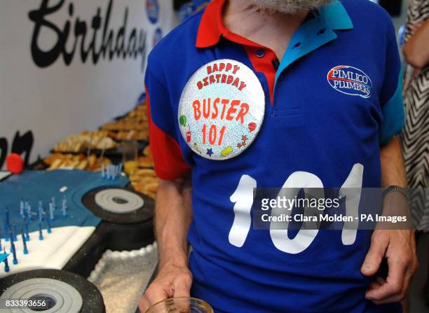 Working plumber Buster Martin celebrates his 101st birthday at his birthday party at the headquarters of Pimlico Plumbers in Lambeth, south London.