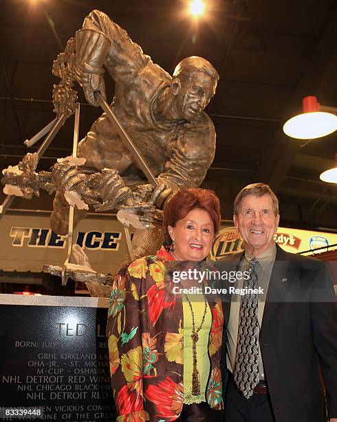 Detroit Red Wing Hall of Famer, Ted Lindsay, poses with his wife Joanne after the unvailing of the statue in his honor in the concorse at Joe Louis...