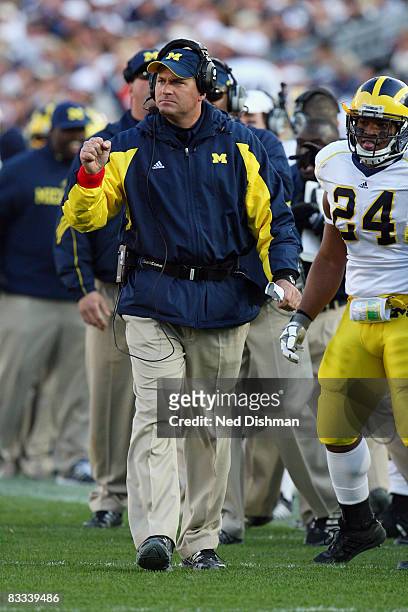 Head coach Rich Rodriguez of the University of Michigan Wolverines celebrates after a touchdown against the Penn State Nittany Lions at Beaver...