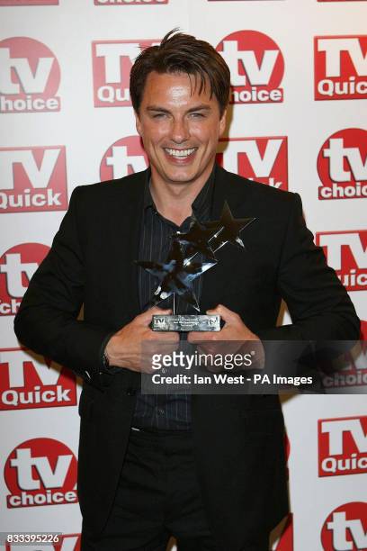 John Barrowman wins the Best New Drama award for Torchwood, at the TV Quick/TV Choice 2007 awards at the Dorchester Hotel, London.