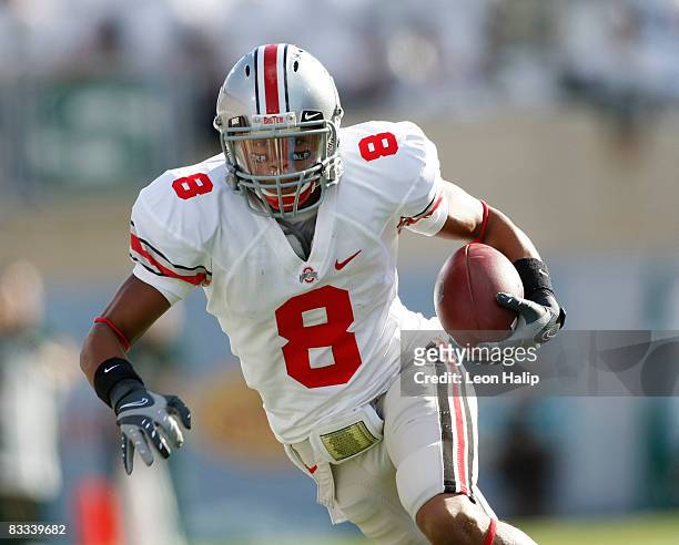 Devier Posey of the Ohio State Buckeyes catches a pass for a first down in the second quarter against the Michigan State Spartans on October 18, 2008...