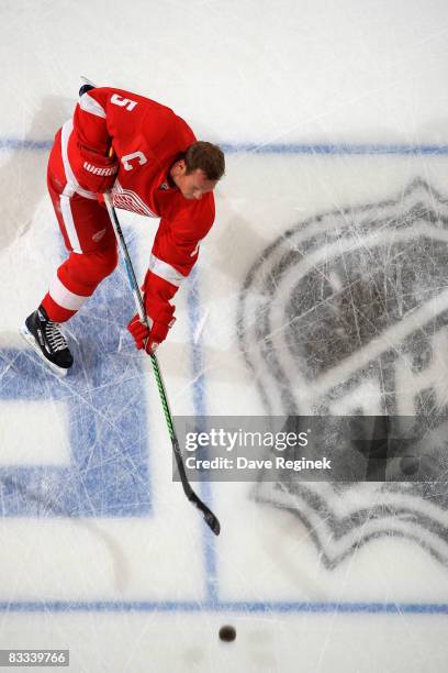 Nicklas Lidstrom of the Detroit Red Wings shoots the puck during warm ups at a NHL game vs. The New York Rangers on October 18, 2008 at Joe Louis...